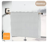 Väggmonterad torkställning för familjens tvätt